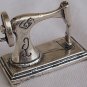 Antique sewing machine miniature