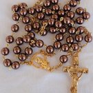 Artificial brown colored pearls beads rosary .
