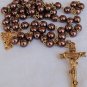 Artificial brown colored pearls beads rosary .