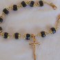 Black glass beads bracelet with golden cross