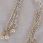 White pearls dangling earrings