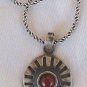 Red pendant with black silver
