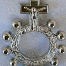 Finger rosary A silver colored