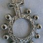 Finger rosary A silver colored