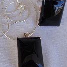 A black agate set ring and pendant