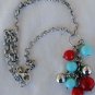 Turquoise red and silver necklace