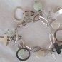 Quartz and silver crosses bracelet