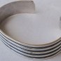 Strips silver bangle