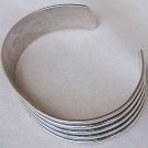 Strips silver bangle