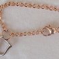 Silver and copper hearts bracelet