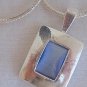 Light blue cat eye pendant