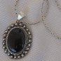 Maskit onyx silver pendant