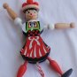 Jumping baker doll