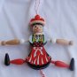 Jumping baker doll