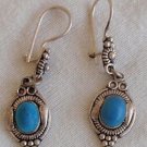 Dangaling aqua blue earrings