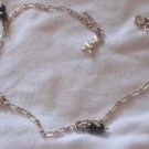 Poult and black silver anklet