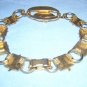 Souvenir bracelet Jasper Alberta Canadian maple leaves gold tone 1022vf