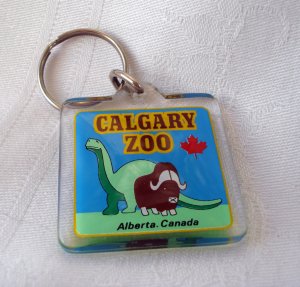 Calgary Zoo Alberta Canada souvenir key chain plastic dinosaur water buffalo 1146vf