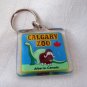 Calgary Zoo Alberta Canada souvenir key chain plastic dinosaur water buffalo 1146vf