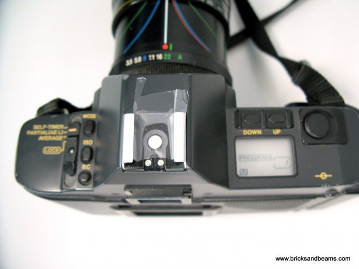 Canon T70 SLR 35mm Film Camera w Zoom 210mm Lens