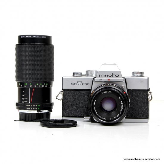 Minolta SRT 200 SLR Film Camera w Minolta 45mm 12 Lens Vivitar Zoom