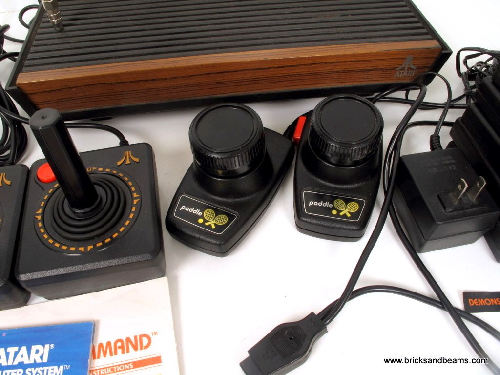 Atari 2600 Video Computer System w 8 Games 2 Joysticks Paddles CX2600A