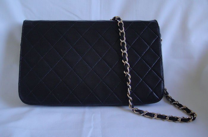 chanel clutch flap