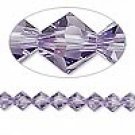 8mm Swarovski Crystal *tanzanite* with silver spacers 7 inch bracelet