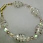 clear stone with purple strips ....