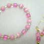Pink and clear with matching earrings