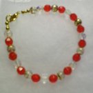 Reds with clear bead bracelet