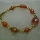 Orange/white bead mixture glass bracelet