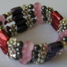 purple, pink, red, black & silver wrap with cats eye