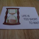 Set of 4 postcards with word design "Life Is Too Short"