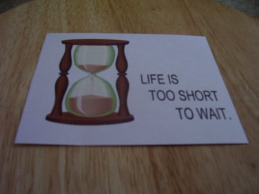 Set of 4 postcards with word design "Life Is Too Short"
