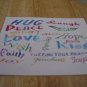 Set of 4 postcards with word design "Hug"