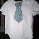 White Onesie with blue and green argyle Necktie