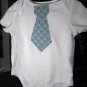 White Onesie with blue and green argyle Necktie