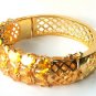 14k yellow gold Yellow sapphire bangle heated stone