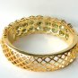 14k yellow gold Green sapphire bangle heated stone