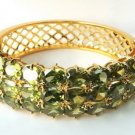 14k yellow gold Green sapphire bangle heated stone