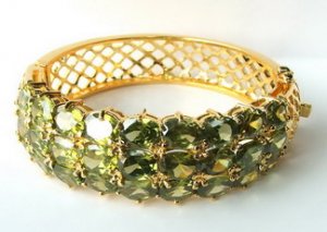 14k yellow gold Green sapphire bangle heated stone