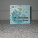 Blue money bank with ballerina