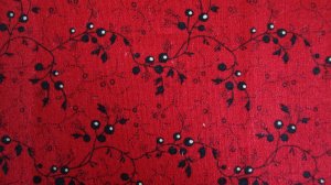 Bolt End In the Beginning Tiny Black Flowers on Red Blended Collection Fabric 2/3 Yards