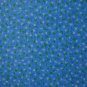 8 3/8" Tiny White and Green Flowers on Light Blue Cotton Fabric Bolt End