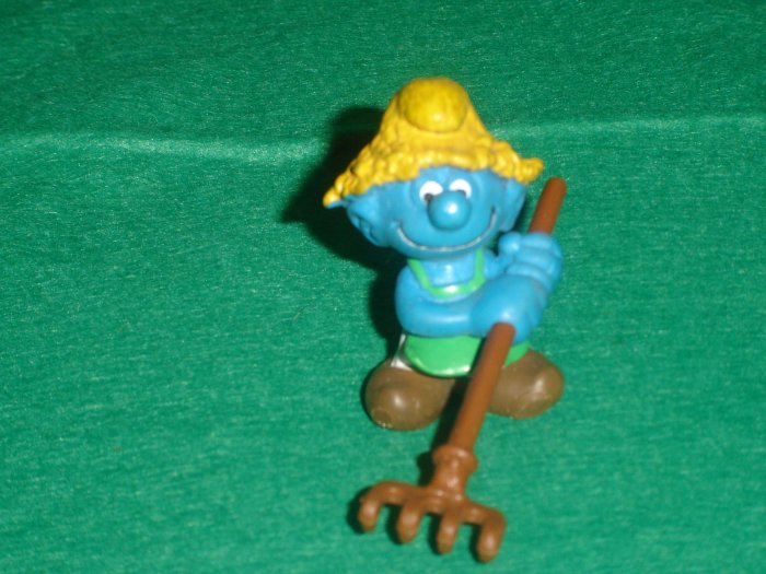 Vintage Smurfs 1983 Haymaker Farmer Smurf With Brown Hat and Brown Rake 20138 Peyo PVC
