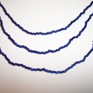 Electric Blue Triple strand necklace with earrings.