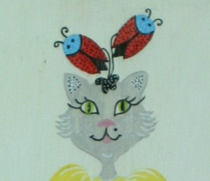 Cat with Lady Bug Clips