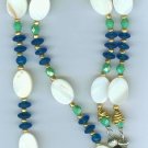 Creamy Mother of Pearl oval with Pacific Blue Saucer Glass Chain