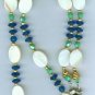 Creamy Mother of Pearl oval with Pacific Blue Saucer Glass Chain